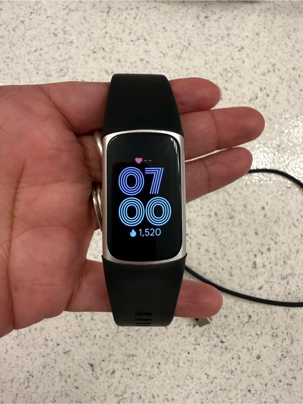 fitbit Black Silicone Band Smart Fitness Tracker with Silver Bezel